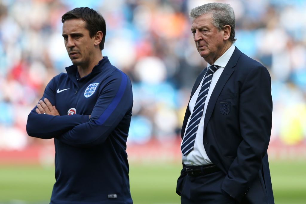 Gary Neville, pictured with England manager Roy Hodgson before the friendly against Turkey on Sunday, is wanted by Manchester United