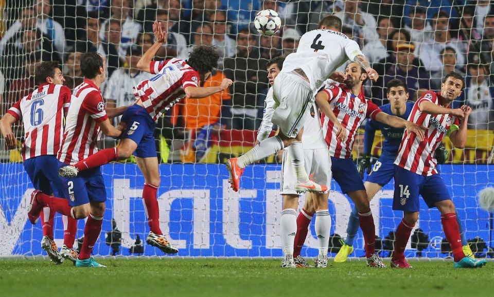 LISBON, PORTUGAL - MAY 24: Sergio Ramos of Real Madrid scores his team's opening goal during the UEFA Champions League Final between Real Madrid CF and Club Atletico de Madrid at Estadio da Luz on May 24, 2014 in Lisbon, Portugal. (Photo by Alexander Hassenstein - UEFA/UEFA via Getty Images)