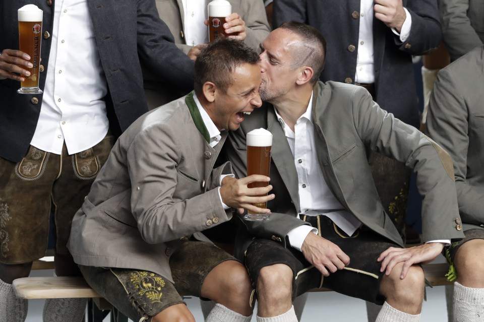 Franck Ribery and Rafinha have a laugh at the upbeat Bavarian festival