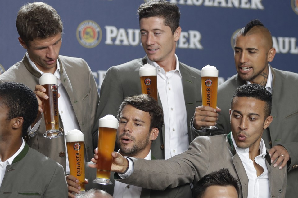 Bayern Munich stars toast with Bavarian beer after Champions League success
