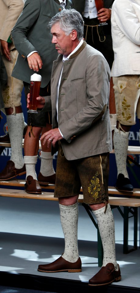 Carlo Ancelotti wears traditional leather breeches and long socks