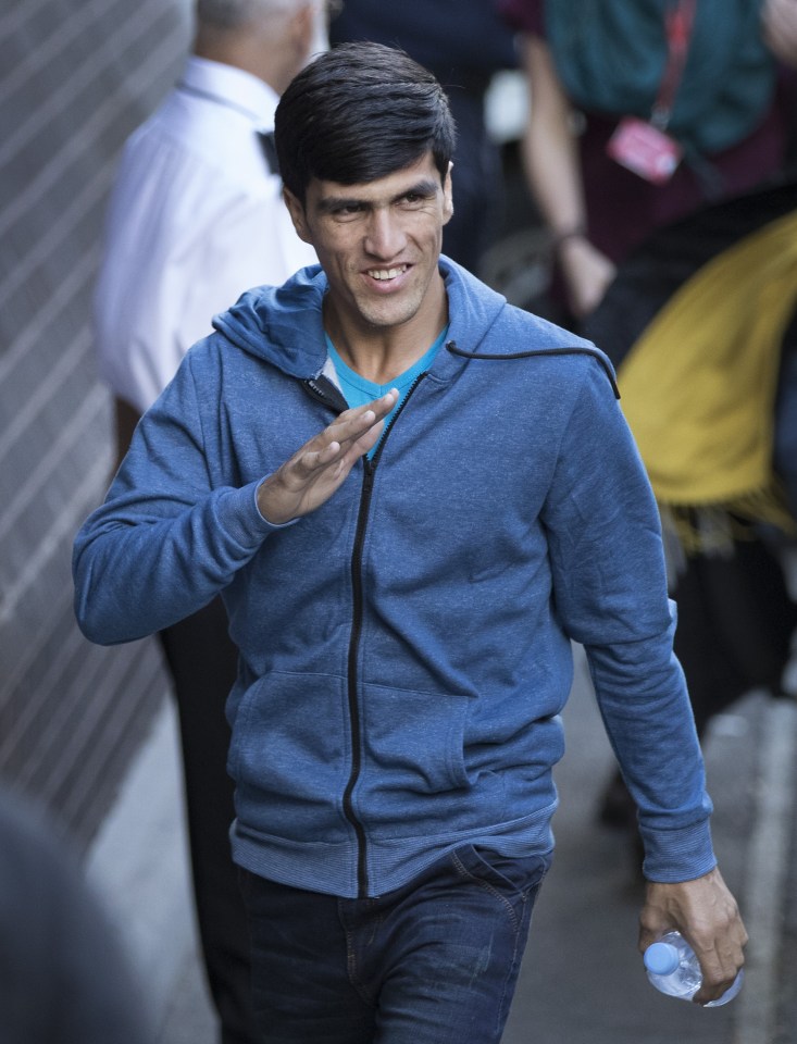 Poster boy or man... one of the immigrant 'children' who've been shipped into the UK from Calais