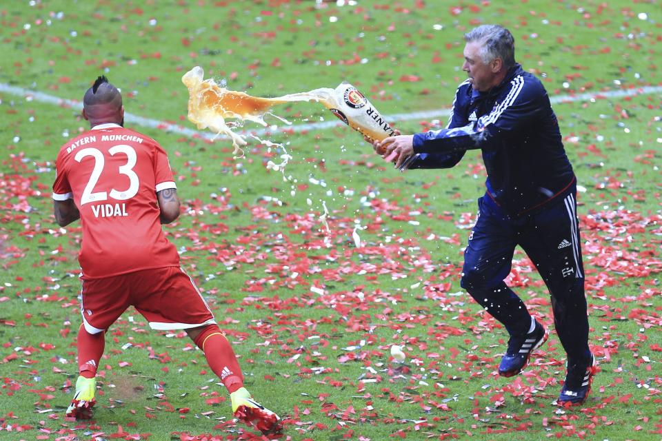 Carlo Ancelotti annd Arturo Vidal celebrate winning the Bundesliga by throwing beer, now that Ancelotti has gone the door could be open for Vidal to leave the German giants