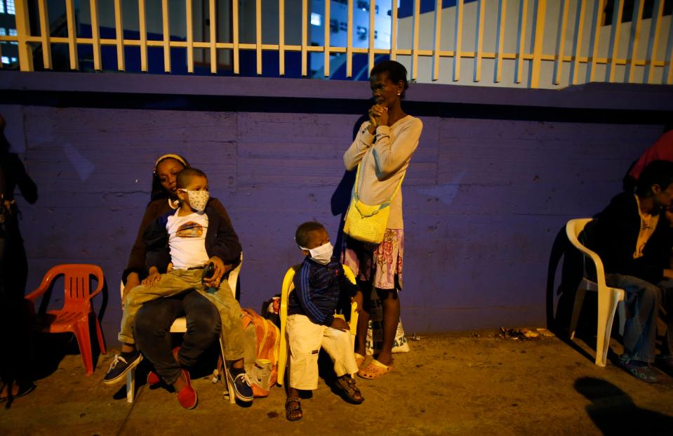 Fearful locals in Venezuela wait for medical treatment on Tuesday night