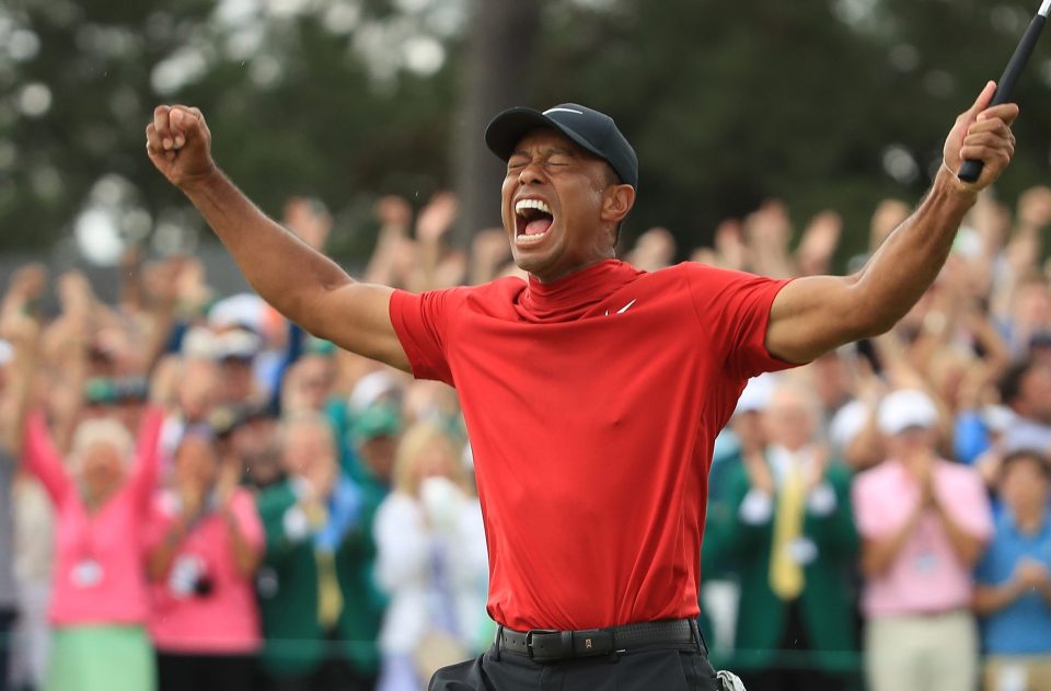  Tiger Woods roars on the 18th green after winning the Masters to seal the greatest comeback in sports