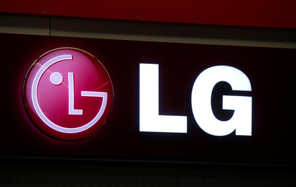 a red and white sign that says lg on it