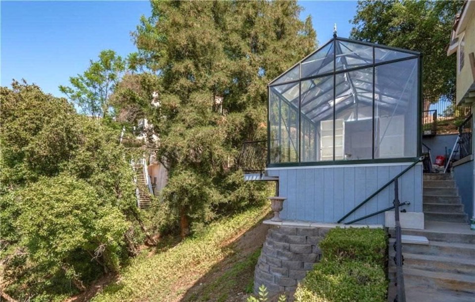  The detached glass house would make the perfect studio