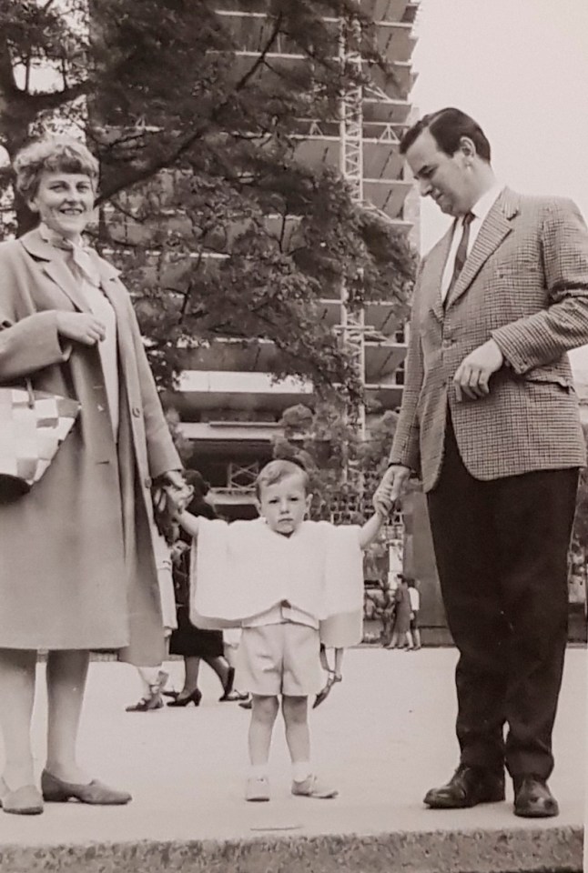 Roberto was adopted by British undercover agent Patrick Witcomb and his wife Joan