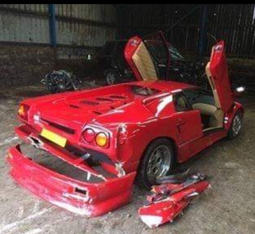The smashed supercar pictured after the crash