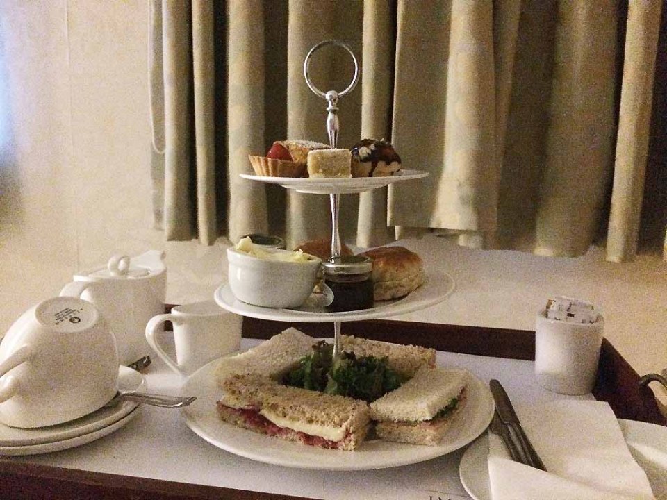 Afternoon tea on a three-tiered stand.