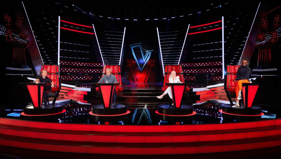 Anne-Marie sits alongside Sir Tom Jones, Olly Murs and Will.I.Am on The Voice panel