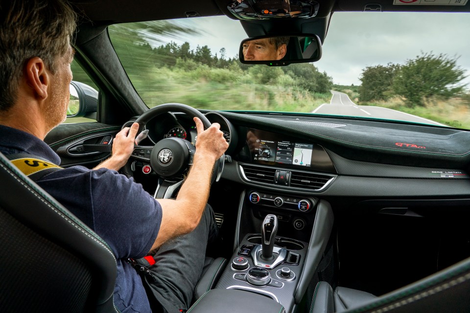 The steering is pin-sharp, almost telepathic, and you can feel the lightness and rigidity of this car when you hurry it