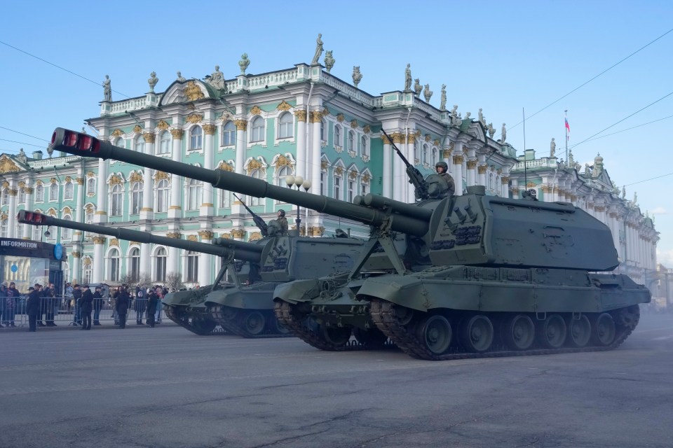 Self-propelled guns rumble as Putin flexes his military muscles to the world