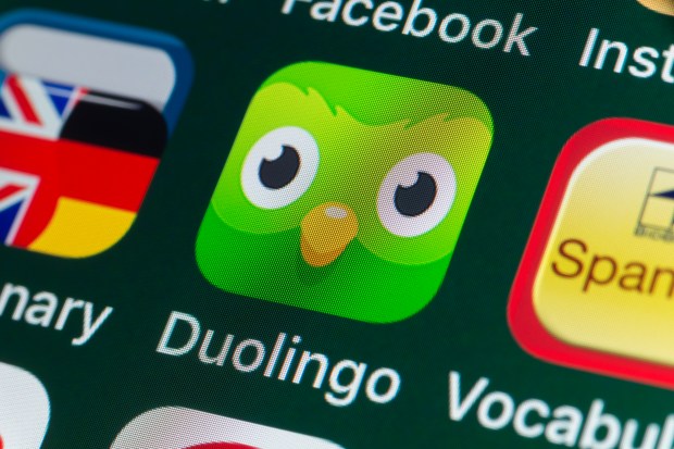 an app called duolingo is displayed on a phone screen