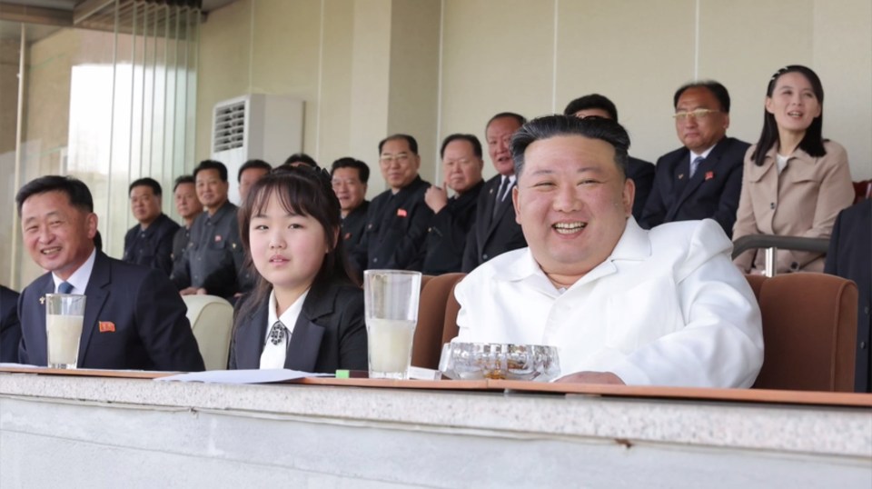 Football fan Kim Jong-un seen at a match with his daughter