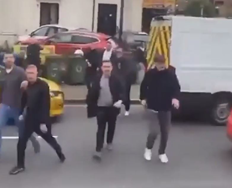 Footage shows a lout hurling a projectile at the bus