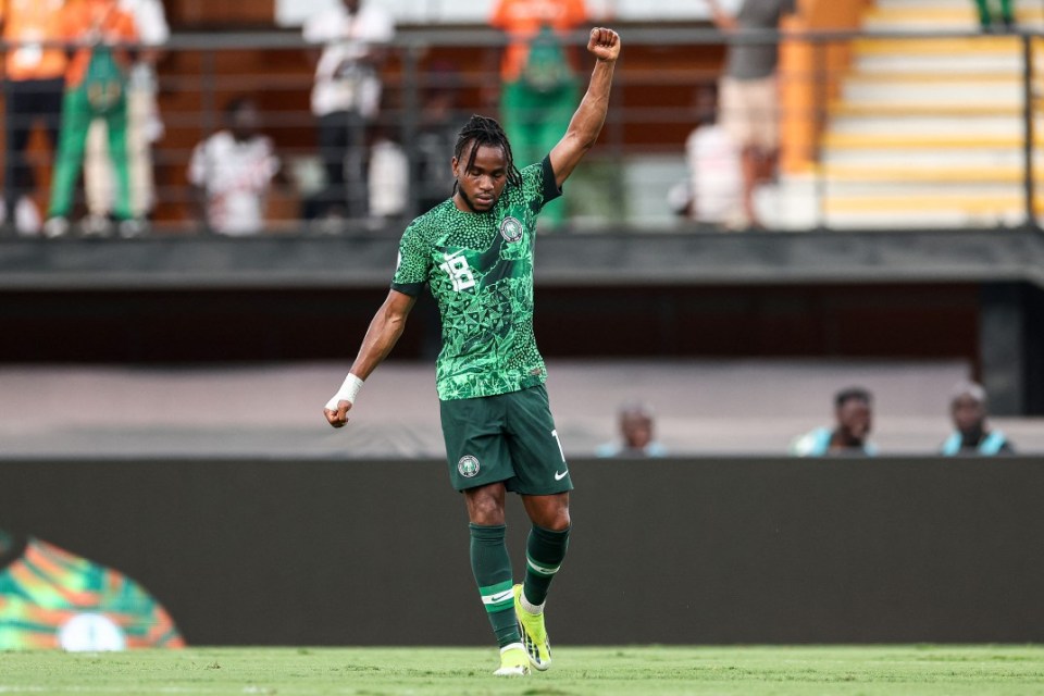 TOPSHOT - Nigeria's forward #18 Ademola Lookman celebrates scoring his team's first goal during the Africa Cup of Nations (CAN) 2024 quarter-final football match between Nigeria and Angola at the Felix Houphouet-Boigny Stadium in Abidjan on February 2, 2024. (Photo by FRANCK FIFE / AFP) (Photo by FRANCK FIFE/AFP via Getty Images)