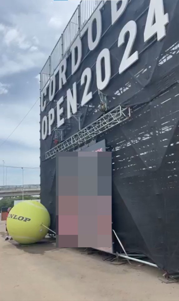 The porn began playing on a screen outside one of the courts