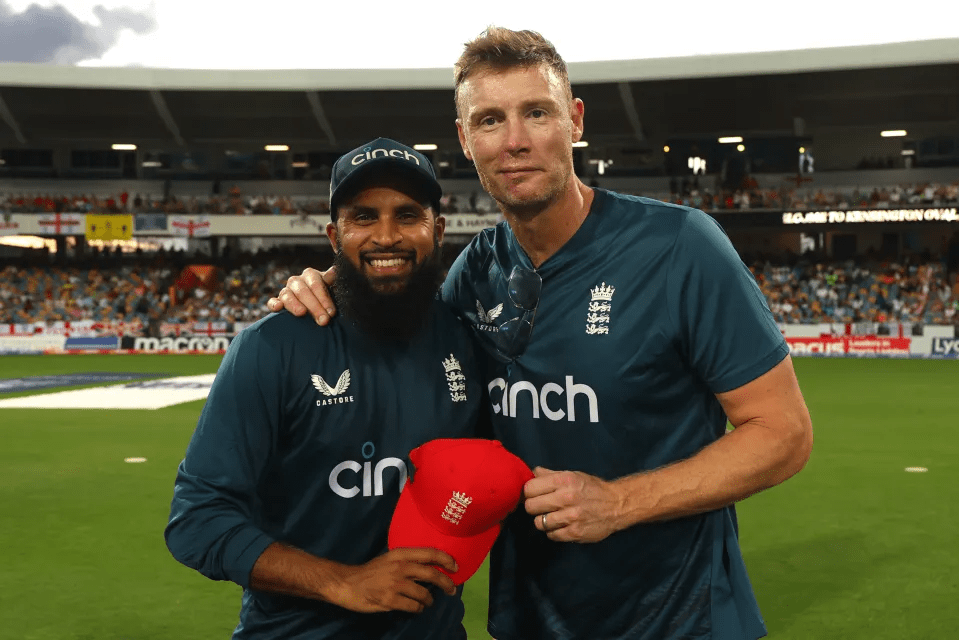 Flintoff awarding Adil Rashid of England his 100th T20 International cap
