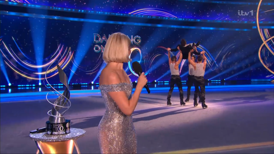 Holly looked on as Stephen Mulhern was lifed high above the ice