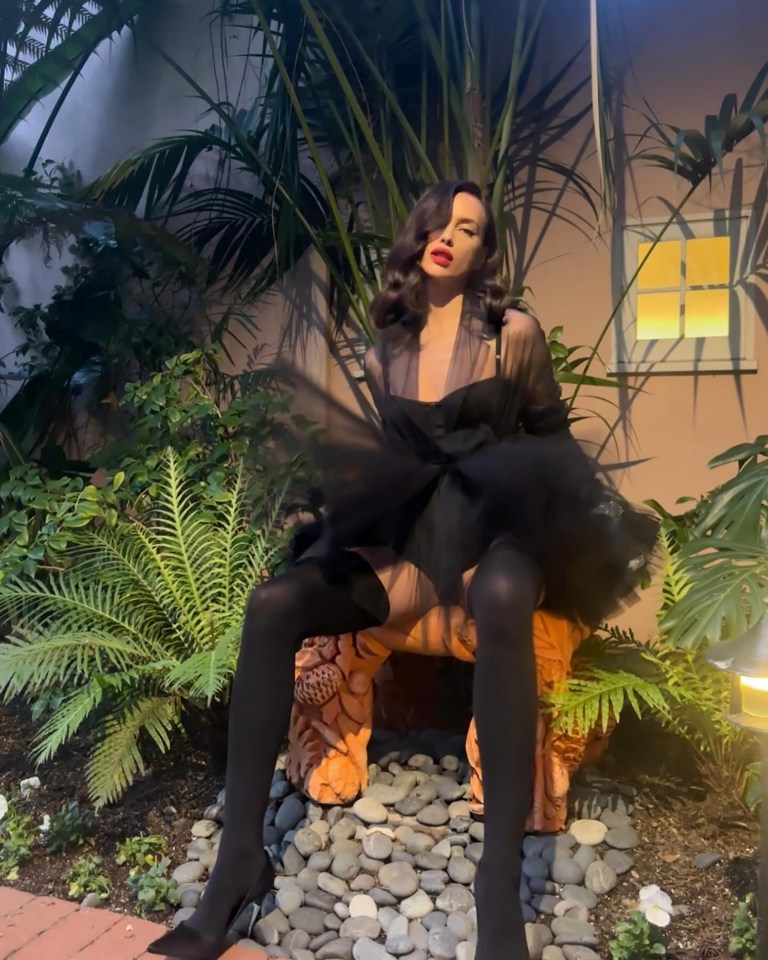 The model topped her look with black stilettos