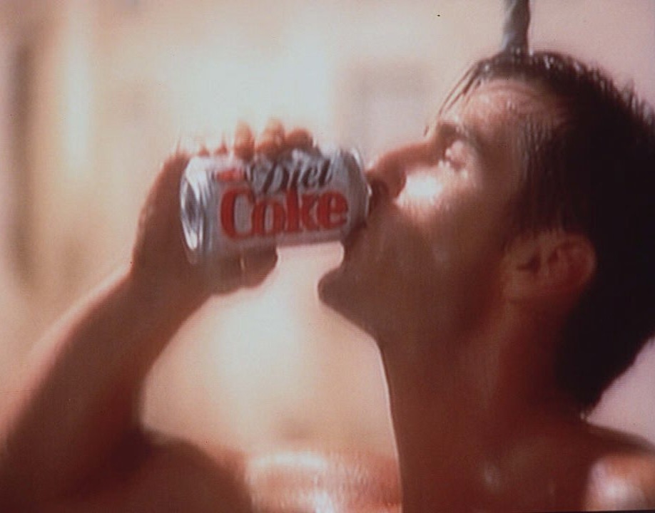 Video still from the new Diet Coke commercial showing US lawyer Robert Merrill, who hopes to create a stir when he strips off in the new soft drinks advert which will hit British screens next week. In the short film entitled Appointment, a gaggle of female admirers book an 11.30am appointment just to watch the window cleaner enjoy his diet Coke break. It will be shown for the first time at 7.30pm on Monday, before hit soap Coronation Street. PA Photos. See PA story CONSUMER Advert