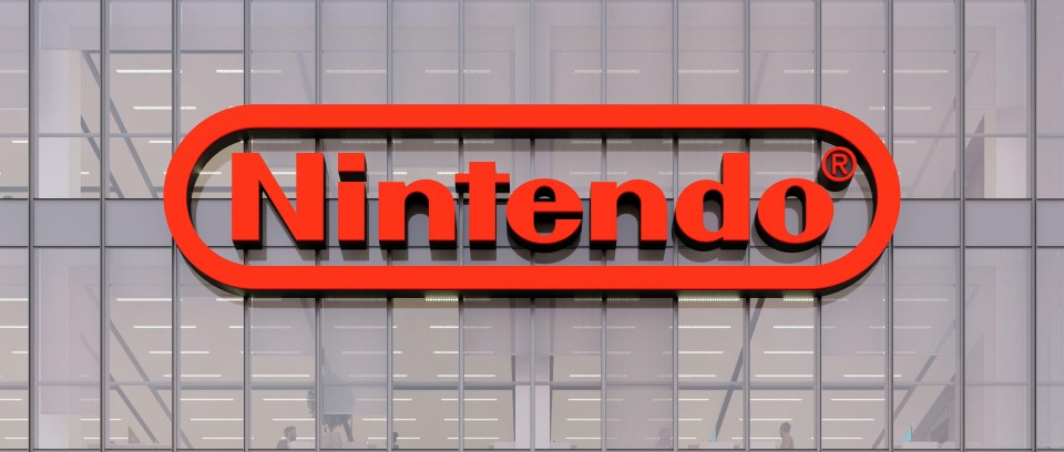 a nintendo logo is on the side of a building