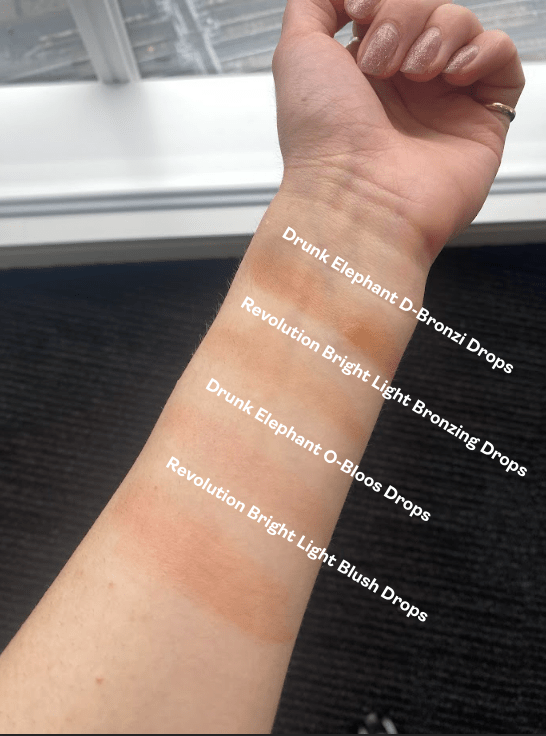 Swatches comparing Revolution and Drunk Elephant blush and bronzer drops.