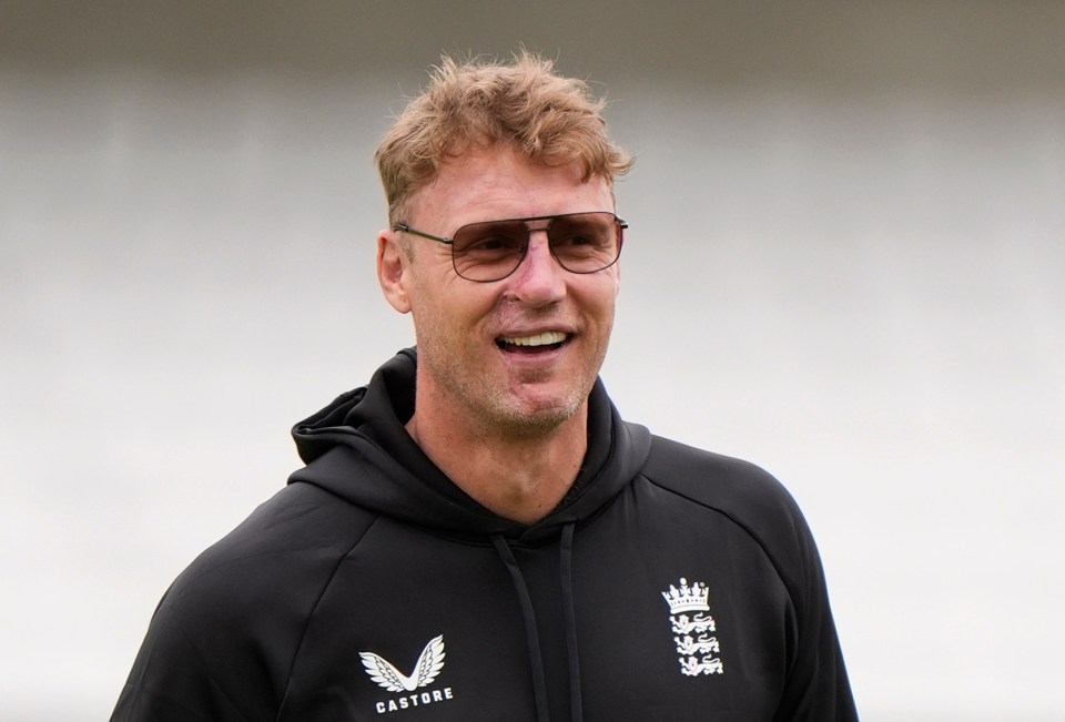 Freddie Flintoff, England cricket coach, smiling.