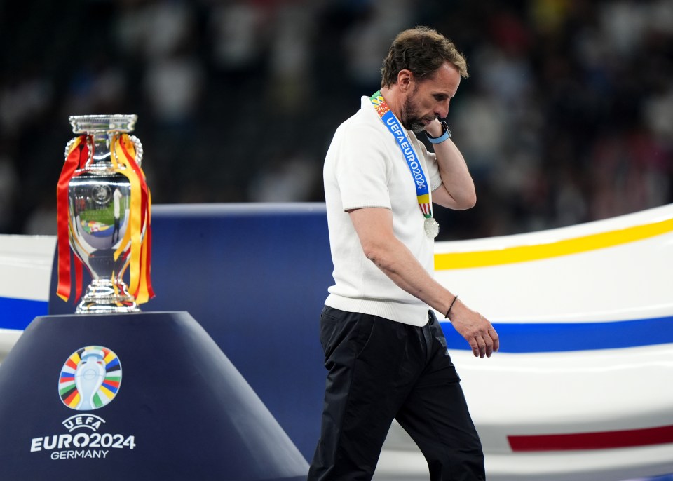 England manager Gareth Southgate walks past the trophy following the UEFA Euro 2024 final match at the Olympiastadion, Berlin. England are looking for a new manager for the first time in eight years after Gareth Southgates decision to step down following defeat to Spain in the Euro 2024 final. Picture date: Sunday July 14, 2024. PA Photo. See PA Story SOCCER England. Photo credit should read: Bradley Collyer/PA Wire. RESTRICTIONS: Use subject to restrictions. Editorial use only, no commercial use without prior consent from rights holder.