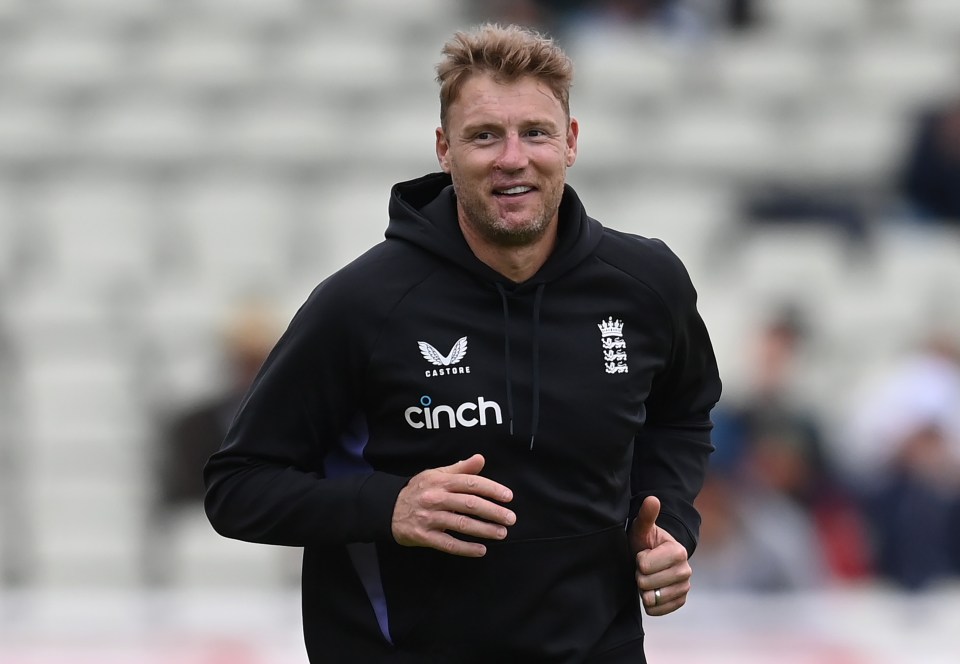 Andrew Flintoff of England looks on.