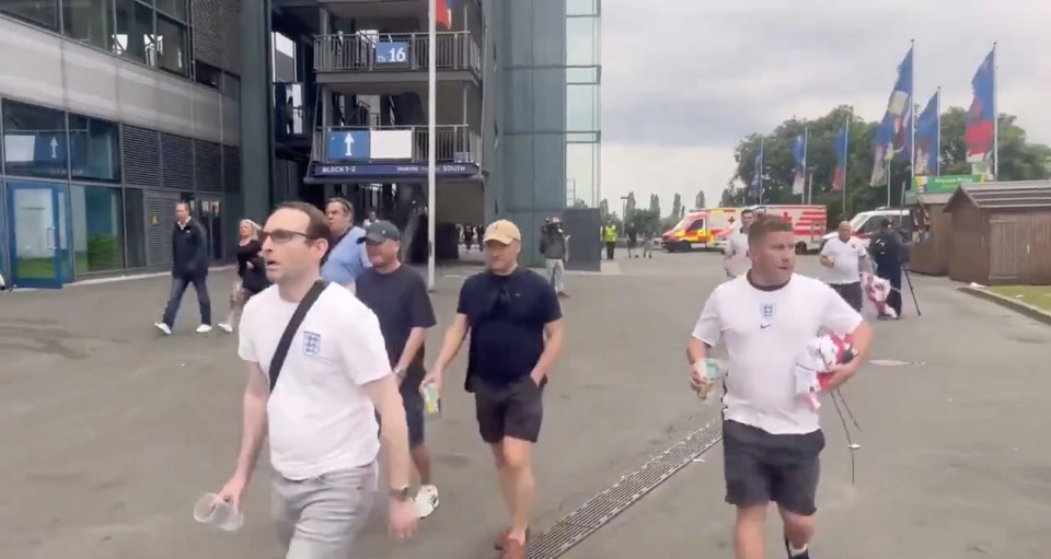 Dejected fans were previously pictured leaving the stadium and ditching the Three Lions