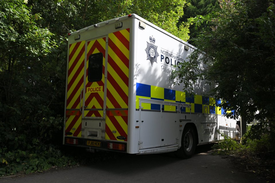 a nottinghamshire police van is parked on the side of the road