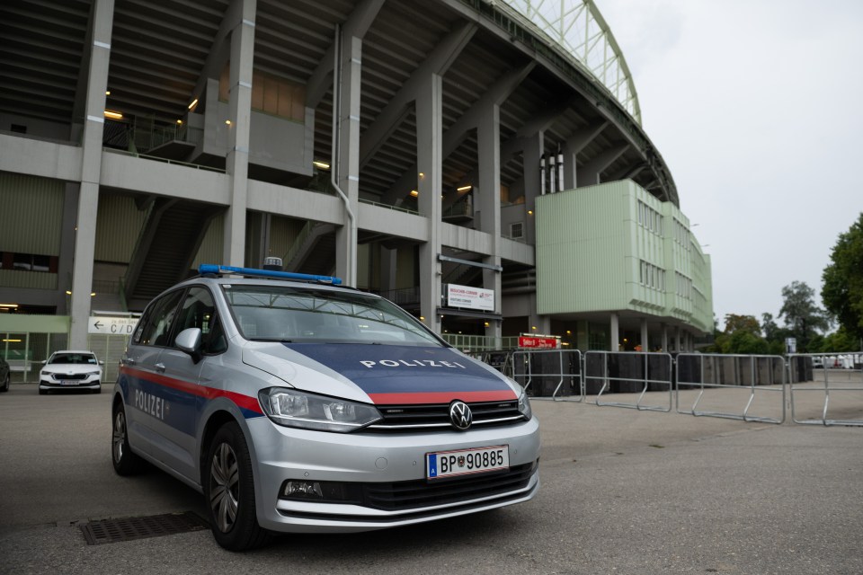 VIENNA, AUSTRIA - AUGUST 08: Police cars park outside Ernst-Happel-Stadion on August 08, 2024 in Vienna, Austria. Three nights of Taylor Swift concerts, which were meant to take place here Thursday, Friday and Saturday, were cancelled after Austrian law enforcement announced it had foiled a suspected attack on the venue. (Photo by Thomas Kronsteiner/Getty Images)