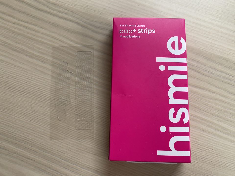 a pink box of hismile teeth whitening pap strips