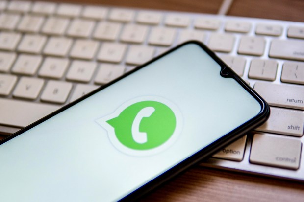 a phone with a green phone icon on the screen