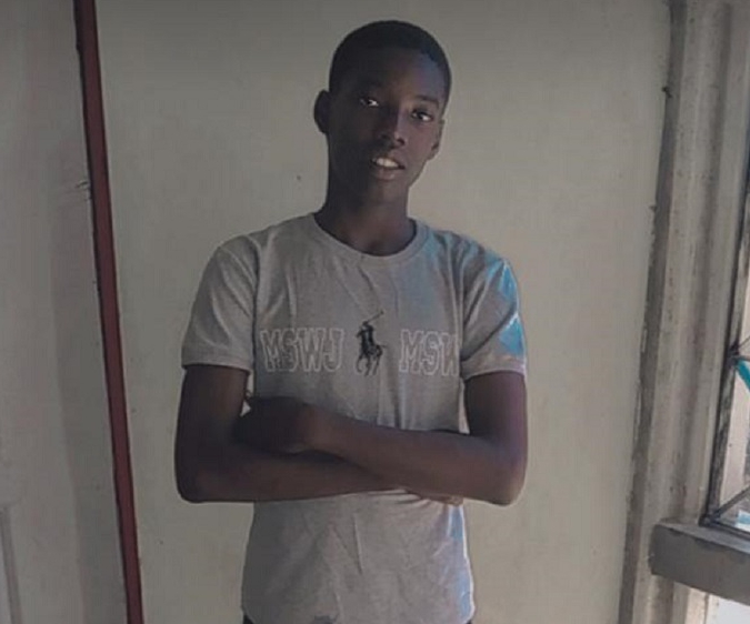 a young man with his arms crossed wears a t-shirt that says kswj msn
