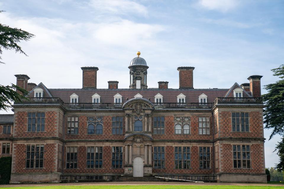 a large brick building with a dome on top of it