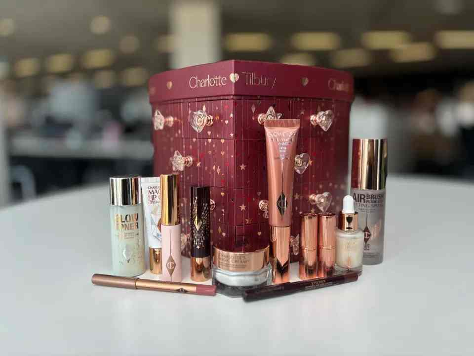 a box of charlotte tilbury cosmetics sits on a table