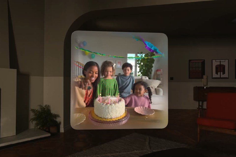 a family is celebrating a birthday with a cake