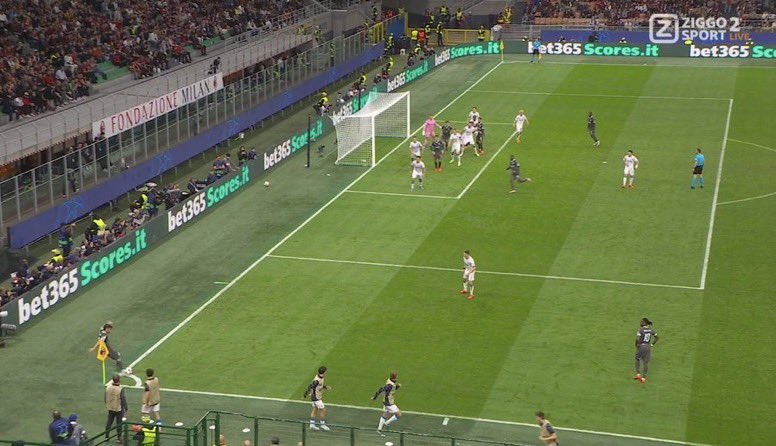 a soccer field with advertisements for bet365 scores.it