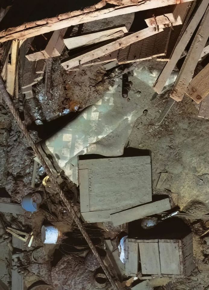 a messy room with a box that says ' a ' on it