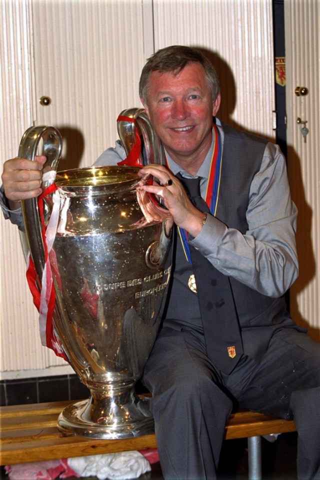 BARCELONA, SPAIN - MAY 26: Sir Alex Ferguson celebrates with the European Cup in the dressing room after the UEFA Champions League Final between Bayern Munich v Manchester United at the Nou camp Stadium on 26 May, 1999 in Barcelona, Spain. Bayern Munich 1 Manchester United 2. (Photo by John Peters/Manchester United via Getty Images)