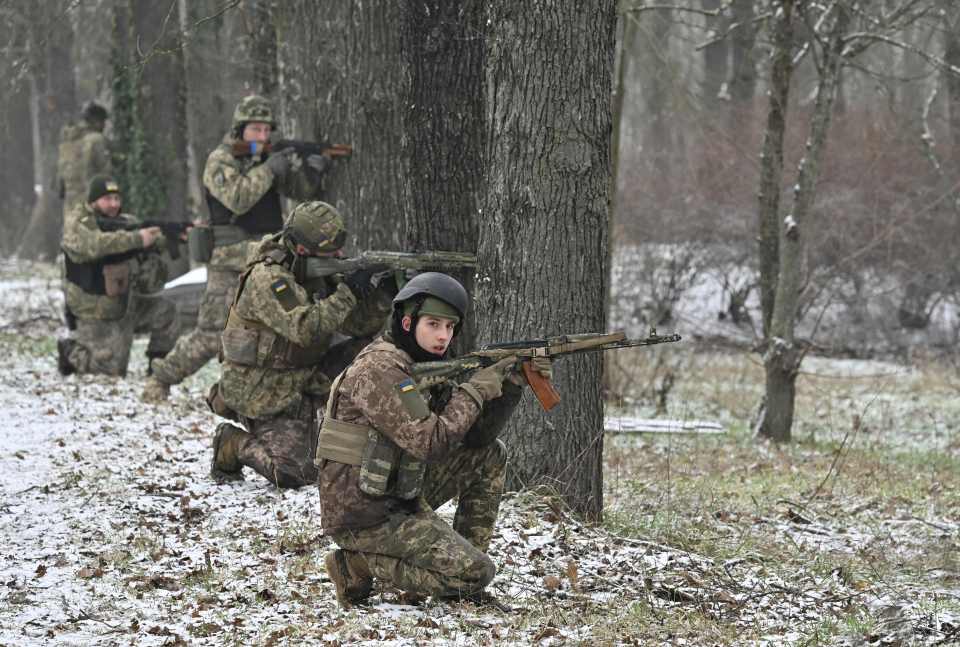 Ukrainian soldiers take firing positions while participating in a military training exercise in the Kherson region, southern Ukraine, on February 1, 2023, amid the Russian invasion of Ukraine. (Photo by Genya SAVILOV / AFP) (Photo by GENYA SAVILOV/AFP via Getty Images)