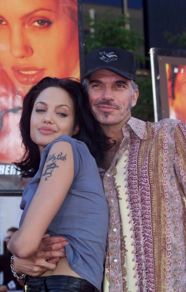 a woman has a tattoo on her arm that says daddy bob