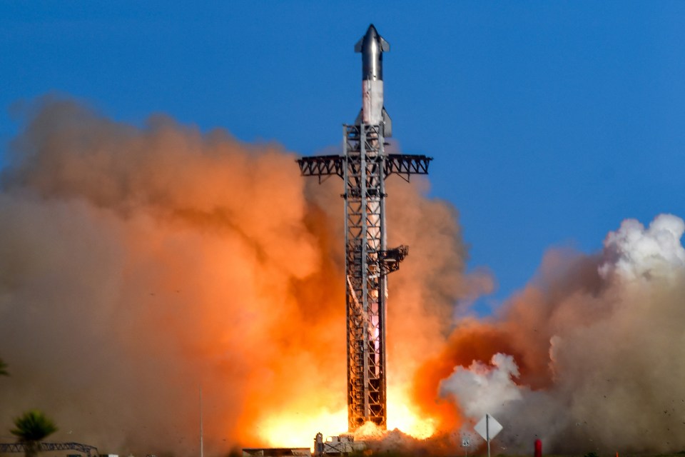 SpaceX Starship launch with aborted booster catch attempt.