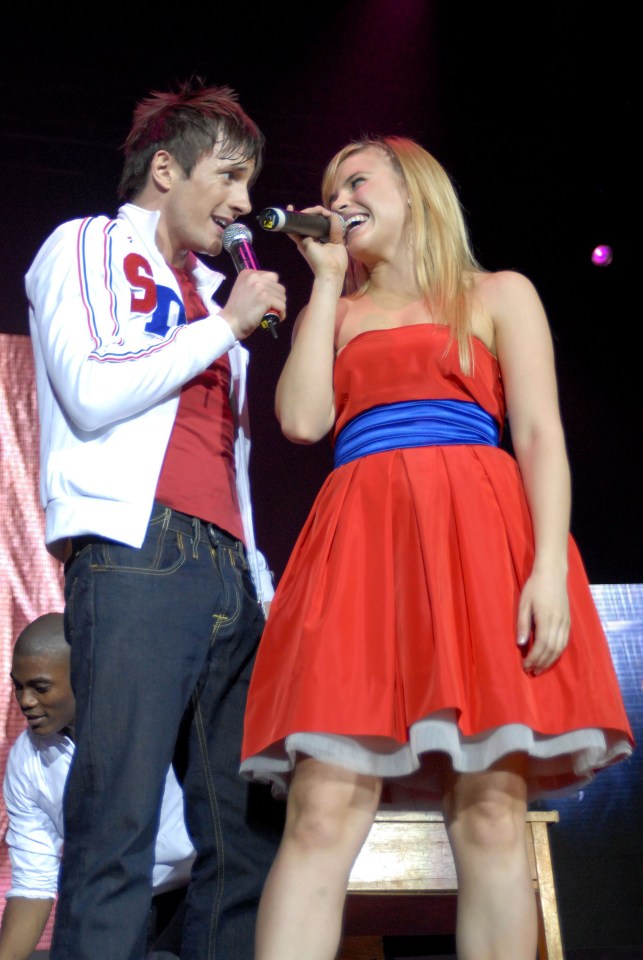 X Factor finalists Sean and Sarah Smith performing on stage.