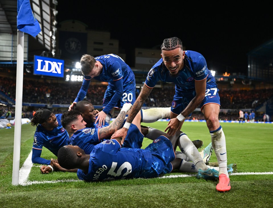 Chelsea players celebrating a goal.
