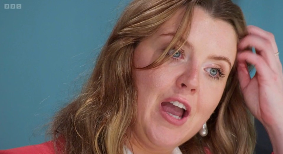Screenshot of a woman speaking.