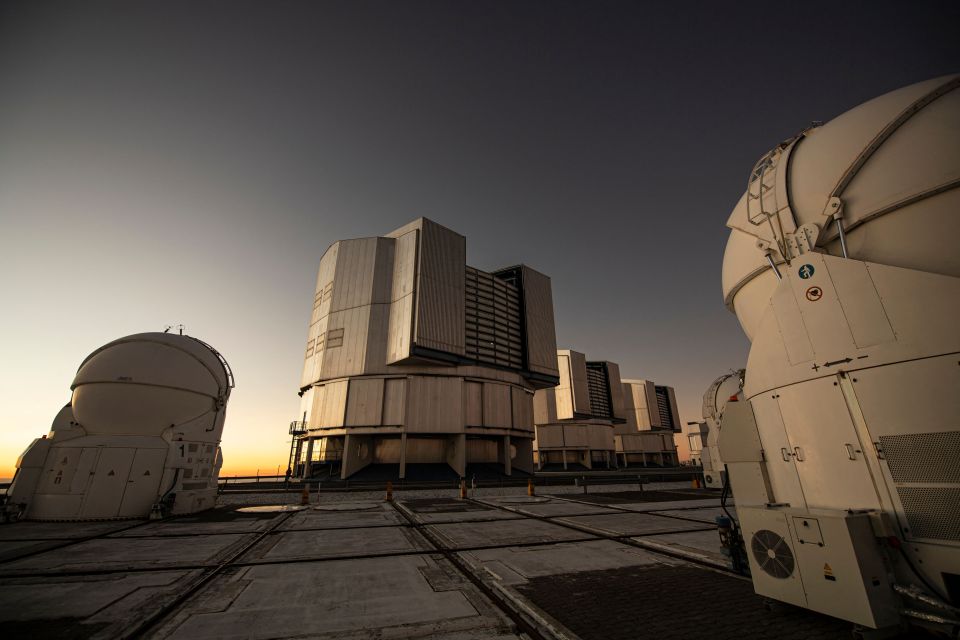The Very Large Telescope (VLT) at the Paranal Observatory in Chile at sunset.